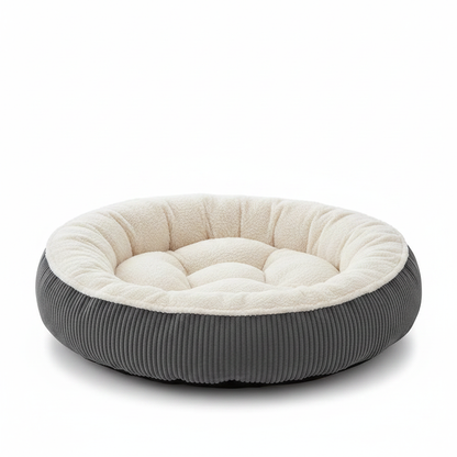 Front side view of round dog bed showing corduroy exterior and bolster walls