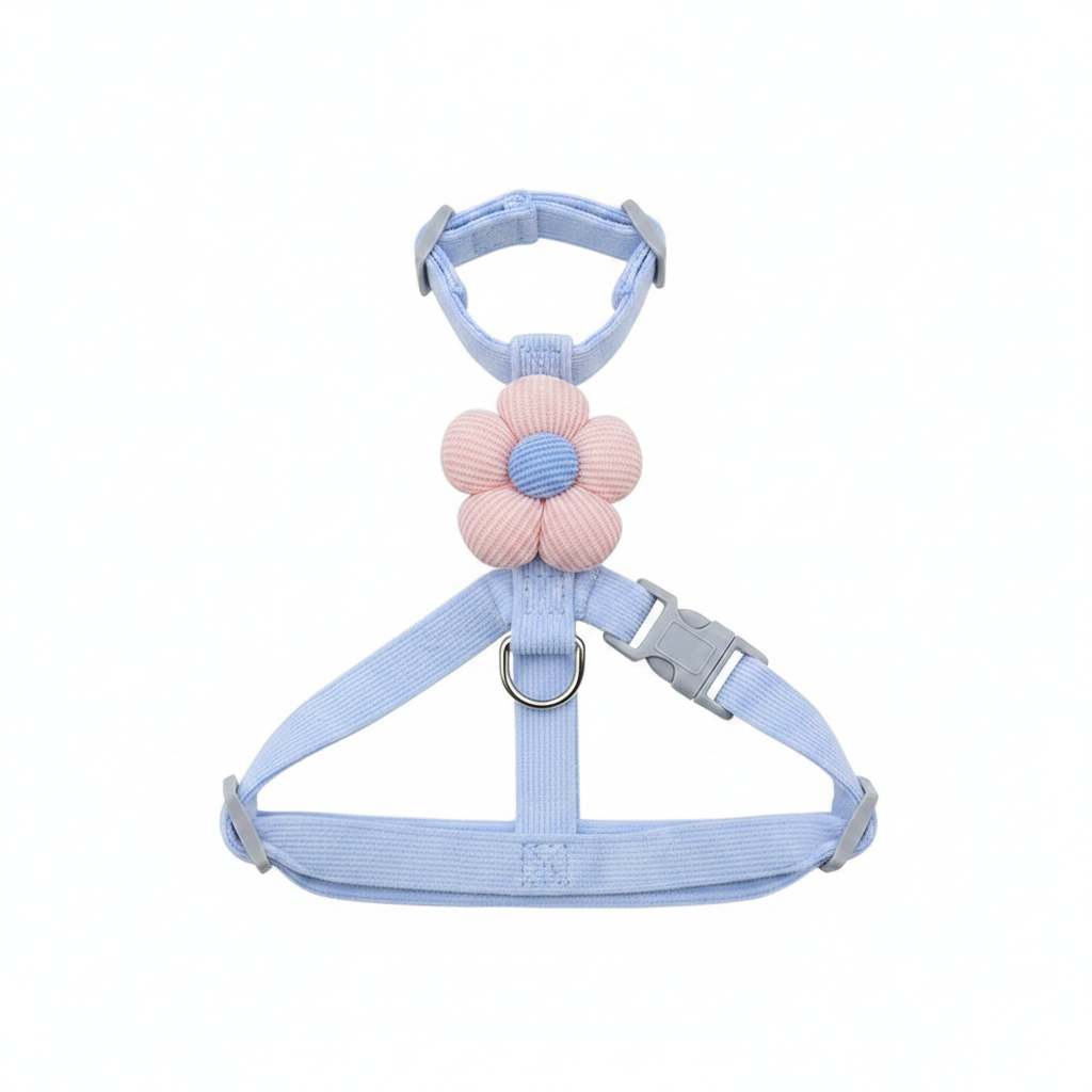 Front view of light blue corduroy cat harness showing H-shape design and flower accent